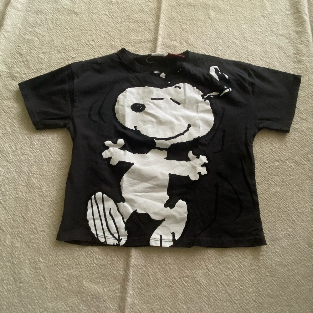 Black t shirt snoopy with pink ready to limbo dance on back